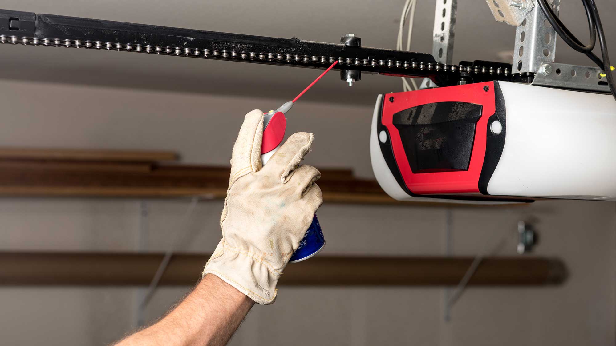 Greasing Garage Door Chain for smooth and quiet operation Greasing Garage Door Chain for smooth and quiet operation