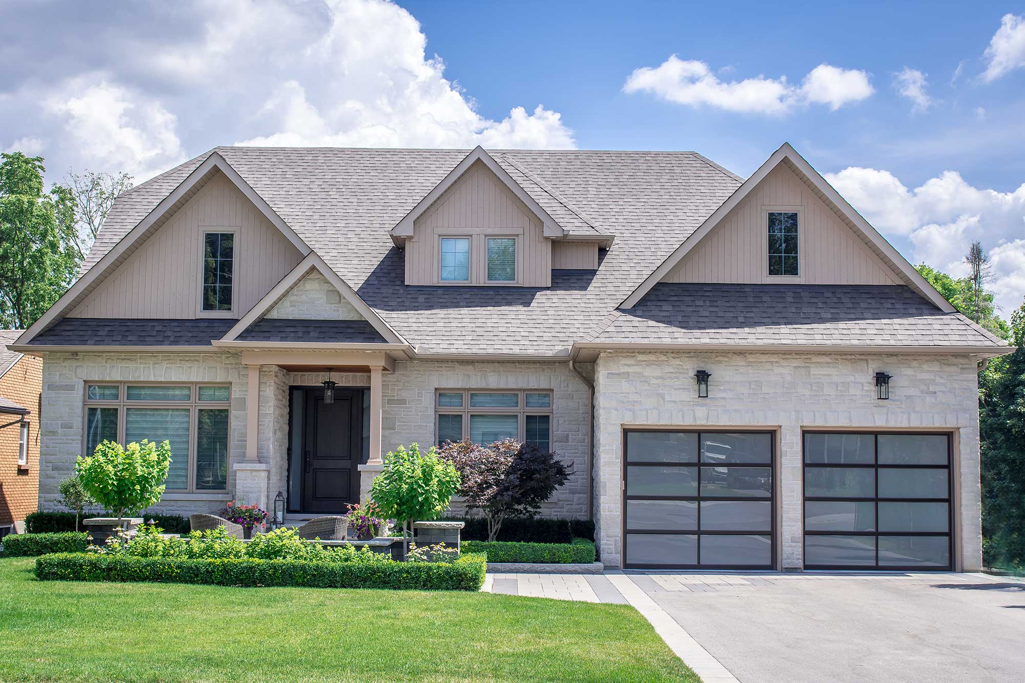Modern Glass Garage Doors for a Residential Property