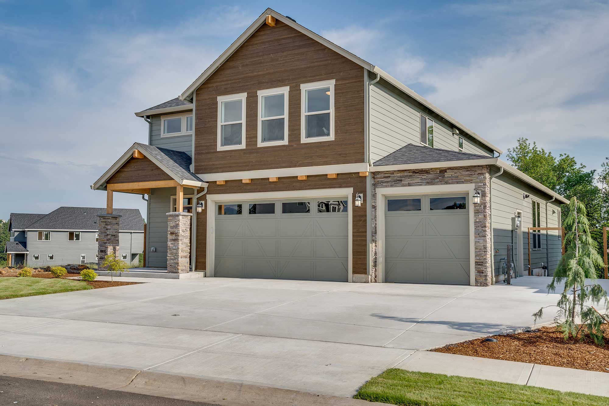 Marble Falls home with metal garage door replacement.