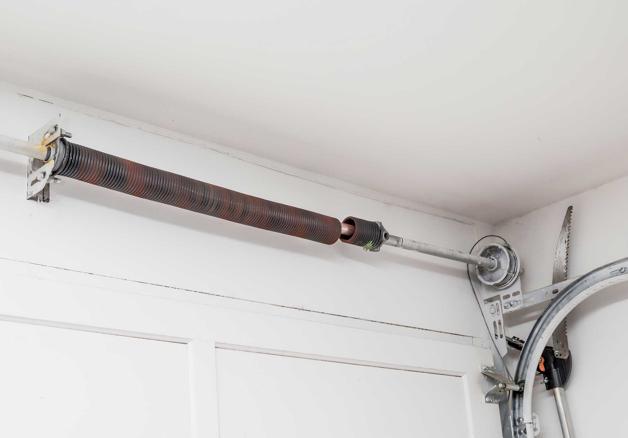 Garage Door Broken Spring that needs to be replaced Repairing garage door opener | FixDoor